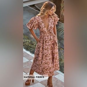 Showpo Amalie The Label pink floral puff sleeve midi wrap dress.